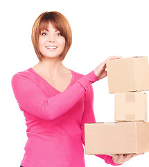 Image showing businesswoman with parcels
