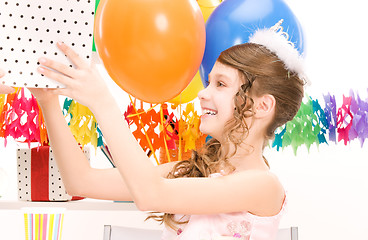 Image showing party girl with balloons and gift box