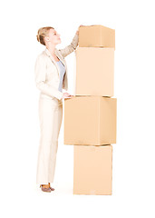 Image showing businesswoman with boxes