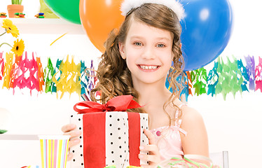 Image showing party girl with balloons and gift box