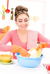 Image showing housewife washing dish