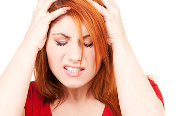 Image showing unhappy redhead woman