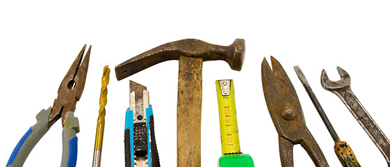 Image showing different retro construction work tools on white 
