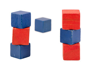 Image showing red blue color toy log blocks stand on white 