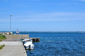 Image showing Small boats at pier