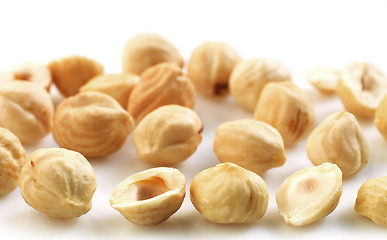 Image showing Closeup view of hazelnuts over white background