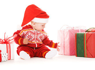 Image showing santa helper baby with christmas gifts