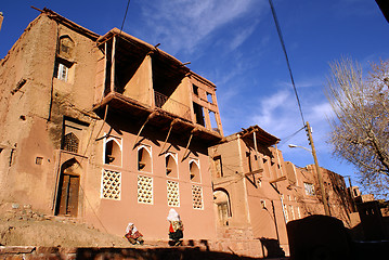 Image showing Two women near the building