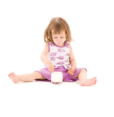 Image showing little girl with yogurt