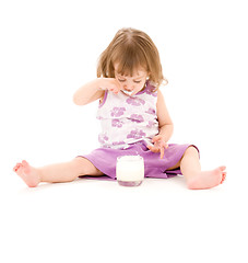 Image showing little girl with yogurt