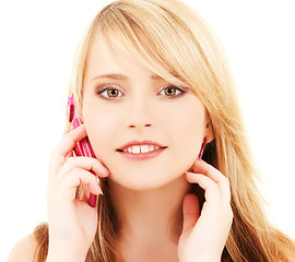 Image showing happy girl with pink phone