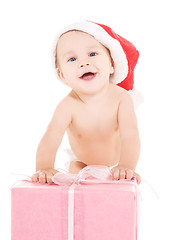 Image showing santa helper baby with christmas gift
