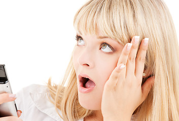 Image showing surprised woman with cell phone