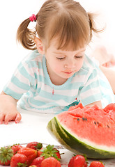 Image showing little girl with strawberry and watermelon