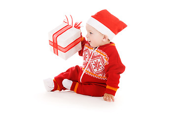 Image showing santa helper baby with christmas gift