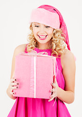 Image showing cheerful santa helper girl with gift box