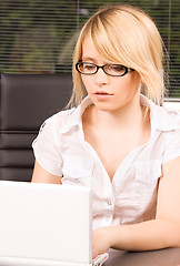 Image showing office girl with laptop computer