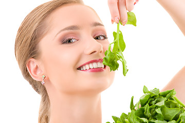 Image showing happy woman with spinach