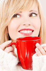 Image showing happy teenage girl with red mug