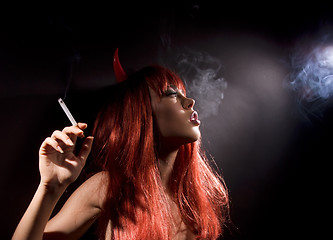 Image showing smoking devil