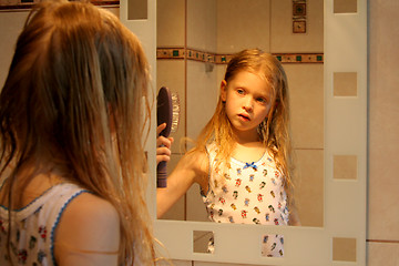 Image showing In front of the mirror