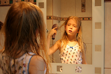 Image showing In front of the mirror