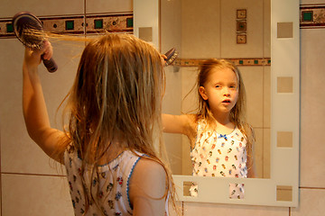 Image showing In front of the mirror