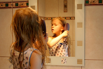 Image showing In front of the mirror