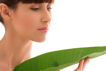 Image showing woman with green leaf