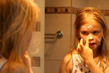 Image showing In front of the mirror