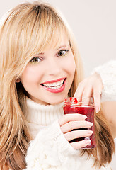 Image showing happy teenage girl with raspberry jam