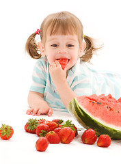 Image showing little girl with strawberry and watermelon