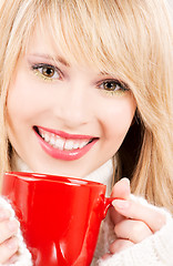 Image showing happy teenage girl with red mug