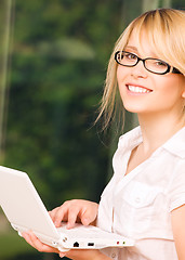 Image showing office girl with laptop computer