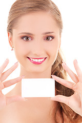 Image showing happy girl with business card