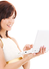 Image showing happy woman with laptop computer