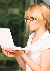 Image showing office girl with laptop computer