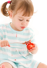 Image showing little girl with strawberry