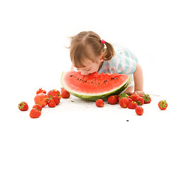 Image showing little girl with strawberry and watermelon