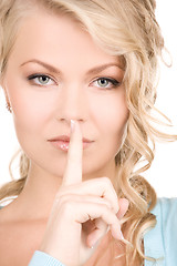 Image showing finger on lips