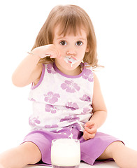 Image showing little girl with yogurt