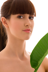 Image showing woman with green leaf