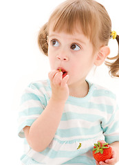 Image showing little girl with strawberry