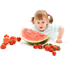 Image showing little girl with strawberry and watermelon