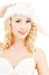 Image showing cheerful santa helper girl