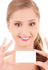 Image showing happy girl with business card