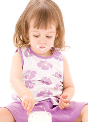 Image showing little girl with yogurt