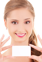 Image showing happy girl with business card