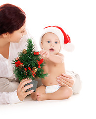 Image showing baby and mother with christmas gifts