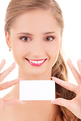 Image showing happy girl with business card